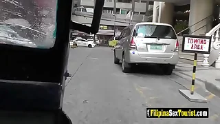 A sexy Asian teen in jet-black lingerie